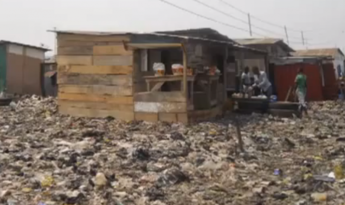 Lagos slum residents live among garbage at “Dustbin Estate”